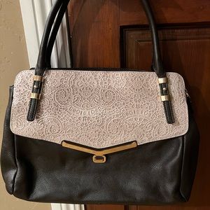 Beautiful brand new Pava handbag black beige I’m front